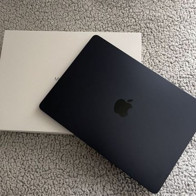 Laptop — light wood — a phone shot before processing