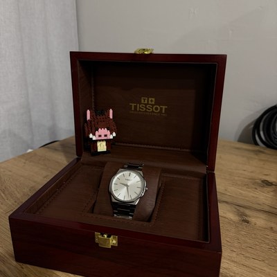 Watch in a box — linen — a phone shot before processing