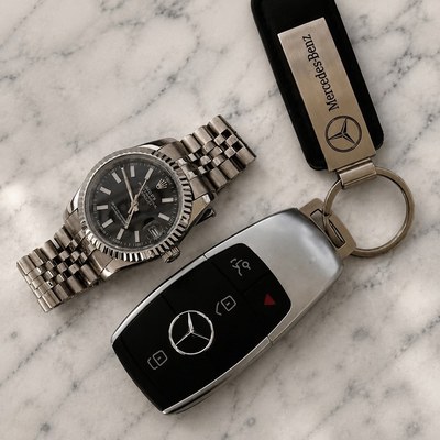 Watch and key — marble — the same shot after the background swap, the subject unchanged